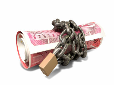 A rolled up british one hundred pound note wrapped with chains and secured with a padlock