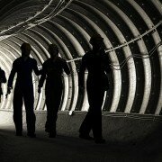 Silhouette of workers in mine