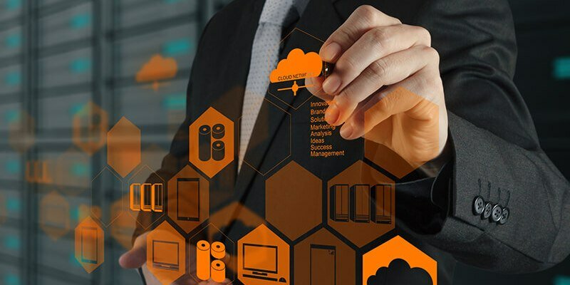 Businessman hand drawing a Cloud Computing diagram on the new computer interface as concept