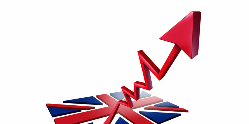 Booming British economy growth and economic Britain GDP increase as a flag transforming into an upward rising arrow as a 3D illustration.