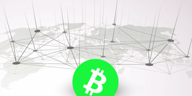Symbol of bitcoin with the world`s map on the background