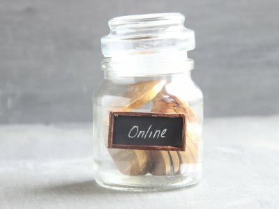 internet banking idea, jar with money and sign online