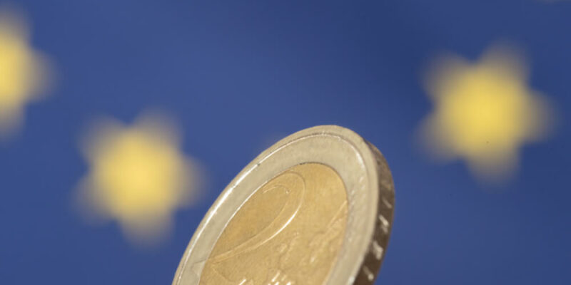 European Union flag and euro coin