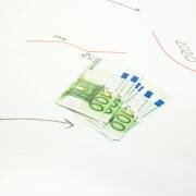 money on the letterhead. Economic growth chart