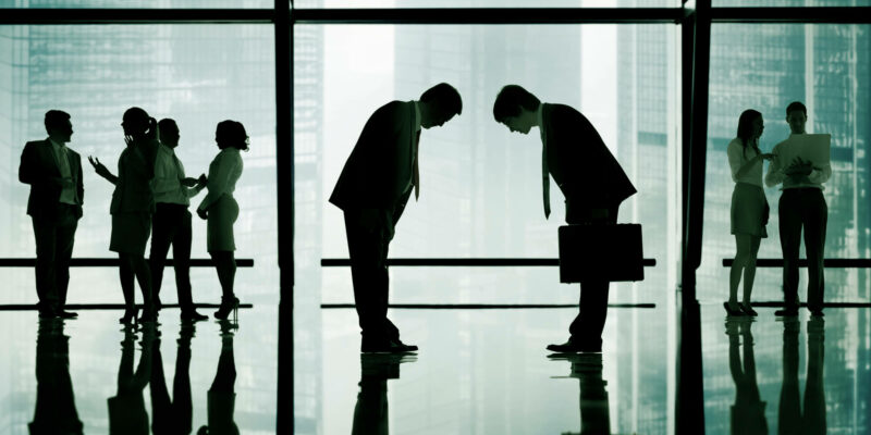 Japanese Business People Bowing Down Office Concept
