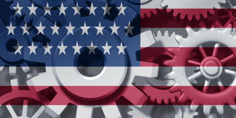 American economy symbol represented by gears and cogs in the shape and color of the flag of the U.S.A. showing industry business and manufacturing working together as a team in the continental U.S.