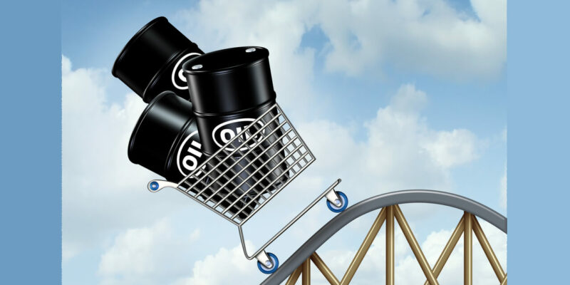 Rising oil prices with a group of oil barrels or steel drum containers in a shopping cart going up on a roller coaster