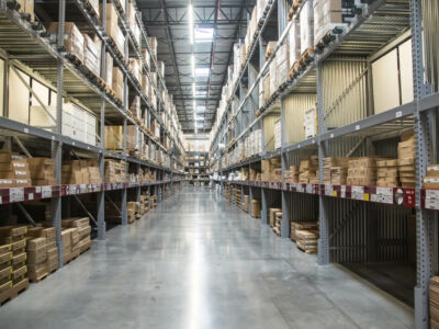 Tall shelves in a well-organized warehouse