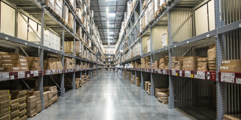 Tall shelves in a well-organized warehouse