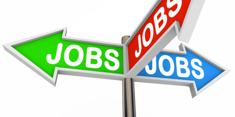 Three colorful arrow signs reading Jobs and pointing in three directions illustrating a plentiful job market for you to find a new position and start a successf
