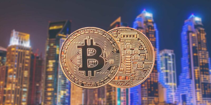 golden coin bitcoin against the background of a modern city