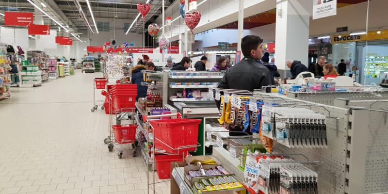 Few customers in the cashier area in the supermarket