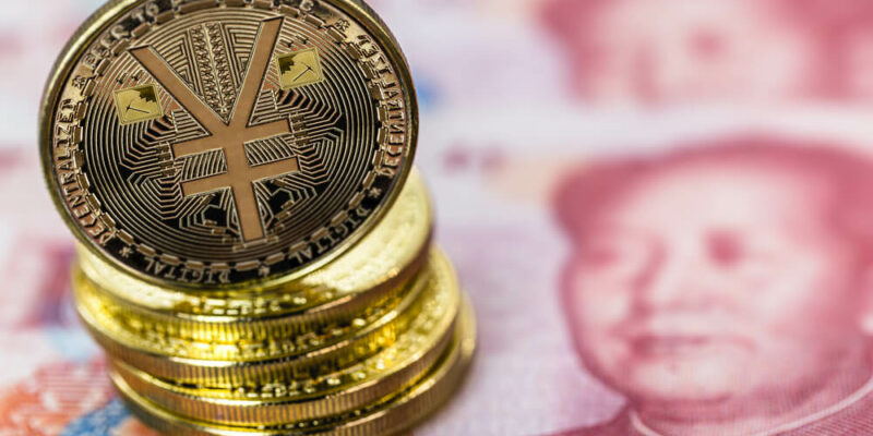 Chinese digital currency, conceptual image of the digital Yuan, or e-RMB, on old yuan banknotes