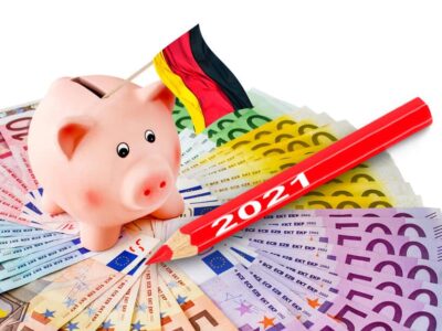 Euro with piggy bank and German flag 2021