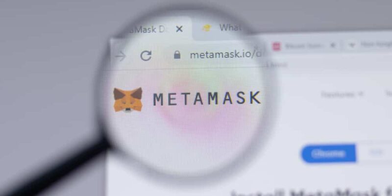 Metamask logo sign, metamask.io icon on website close-up, Illustrative Editorial