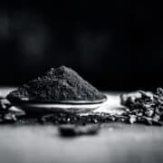 Powder of coal with raw coal and clove,