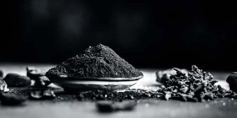 Powder of coal with raw coal and clove,