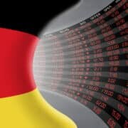 National flag of Germany with a large display of daily stock market price and quotations during economic recession period. The fate and mystery of German stock market, tunnel/corridor concept.