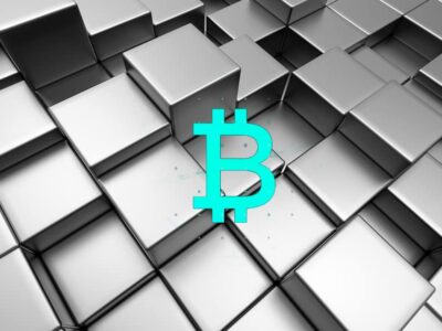 Abstract urban background of 3d blocks with bitcoin logo