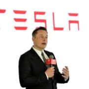 Tesla CEO Elon Musk speaks during a press conference for Tesla Firmware 7.0