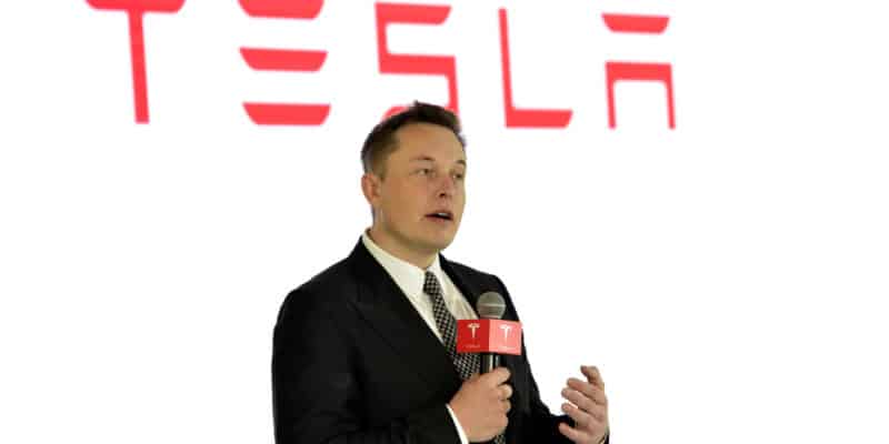 Tesla CEO Elon Musk speaks during a press conference for Tesla Firmware 7.0